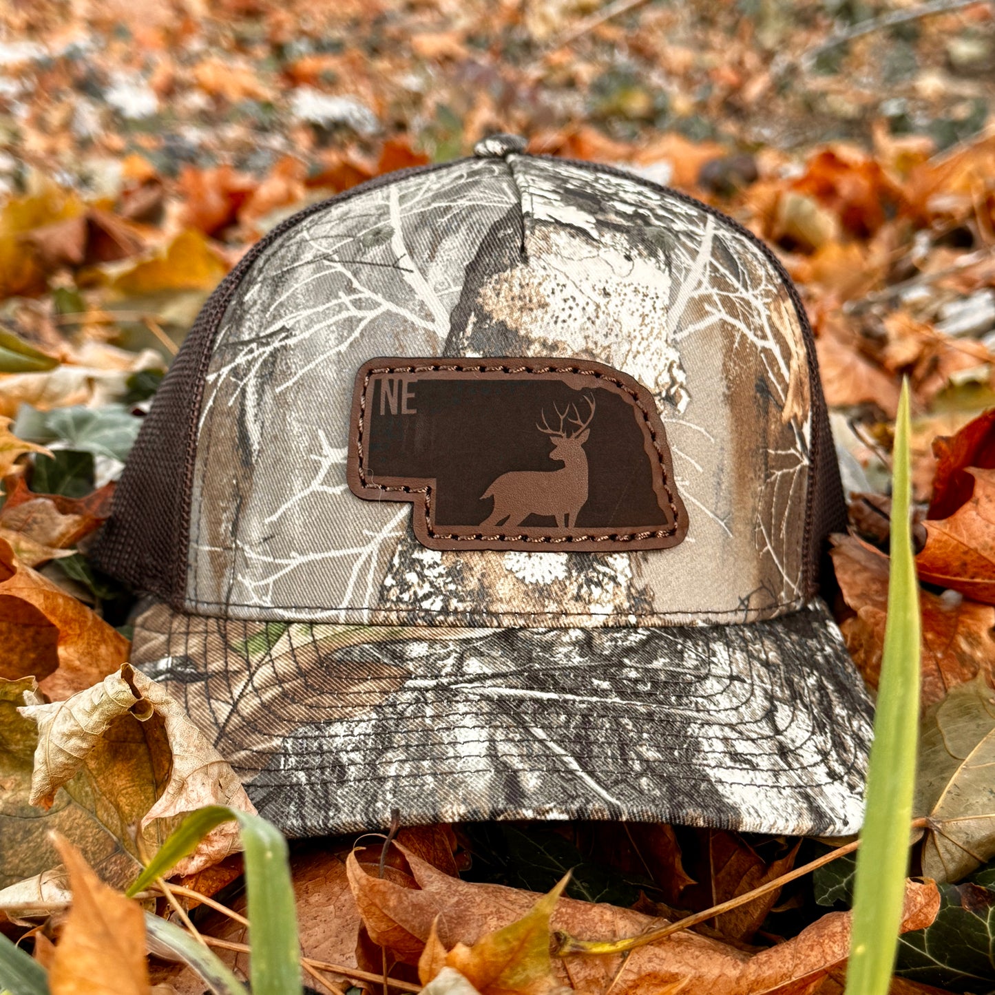 Nebraska Buck Hunting Leather Patch Trucker Hat