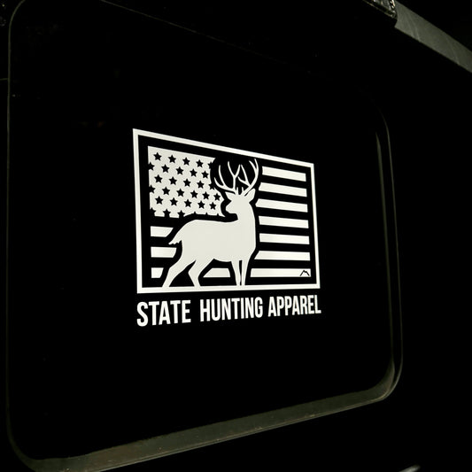 7" x 5" USA Buck Design Window Decal with the words "State Hunting Apparel" on a truck rear window 